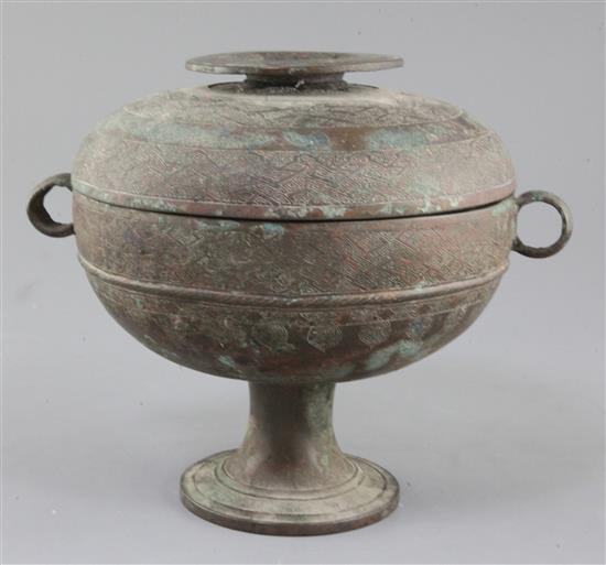 A Chinese archaic bronze ritual vessel and cover, Dou, Warring States period, 5th-4th century B.C., 20.5cm high, 24cm wide